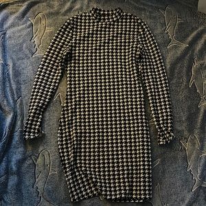 Forever 21 black and white patterned dress. Soft but textured material.